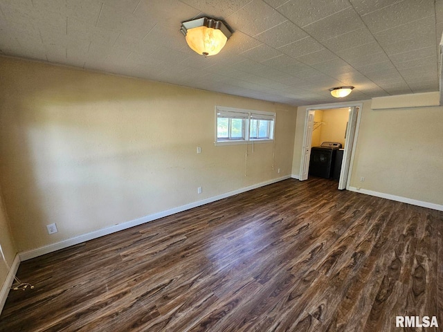 2 Parker Dr, Mount Vernon, IL 62864 - spare room featuring dark wood-style flooring, baseboards, and washer / clothes dryer