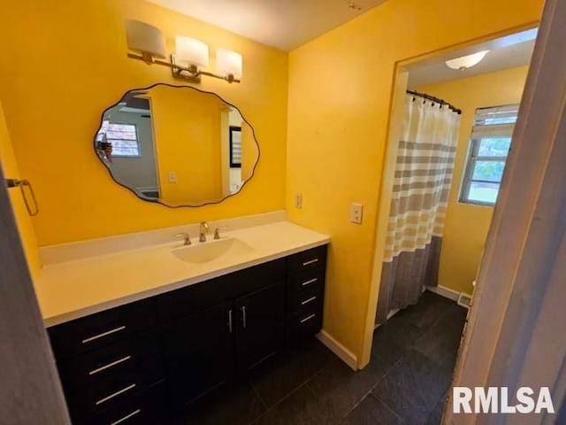 2 Parker Dr, Mount Vernon, IL 62864 - bathroom with tile patterned flooring, vanity, and baseboards