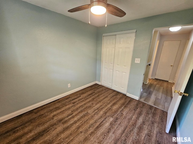 2 Parker Dr, Mount Vernon, IL 62864 - unfurnished bedroom featuring dark wood-style floors, baseboards, a closet, and a ceiling fan