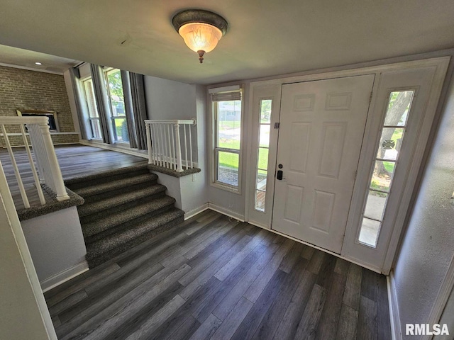 2 Parker Dr, Mount Vernon, IL 62864 - foyer entrance featuring dark wood-type flooring, stairs, and baseboards