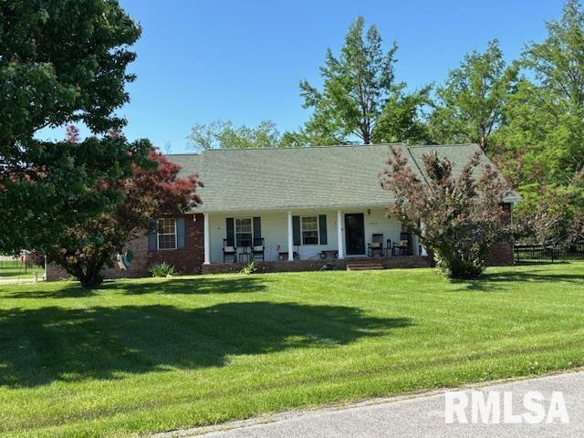 1500 Saint Andrews Pl, Herrin, IL 62948 - ranch-style home with a porch and a front yard