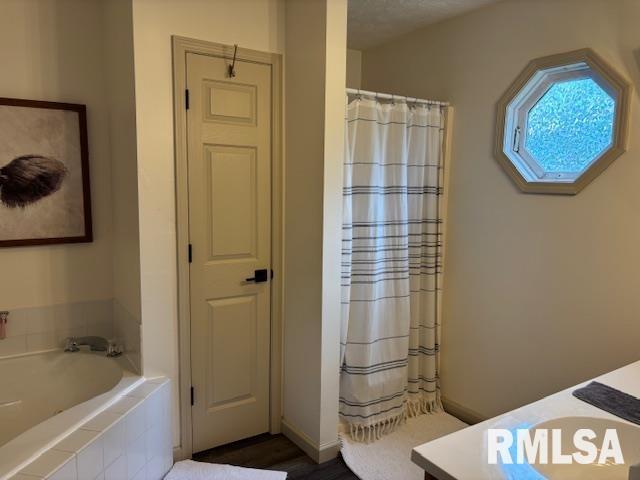 1500 Saint Andrews Pl, Herrin, IL 62948 - bathroom with a bath, curtained shower, and vanity