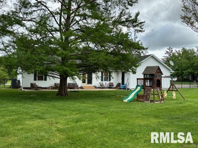 1500 Saint Andrews Pl, Herrin, IL 62948 - back of house featuring a playground