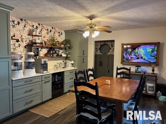 1500 Saint Andrews Pl, Herrin, IL 62948 - dining room with a textured ceiling, dark wood finished floors, beverage cooler, and ceiling fan