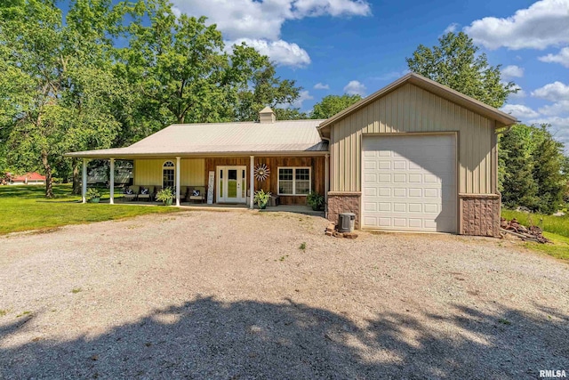 540 Kendall Ln, Marion, IL 62959 - single story home featuring driveway, a chimney, an attached garage, metal roof, and a front yard