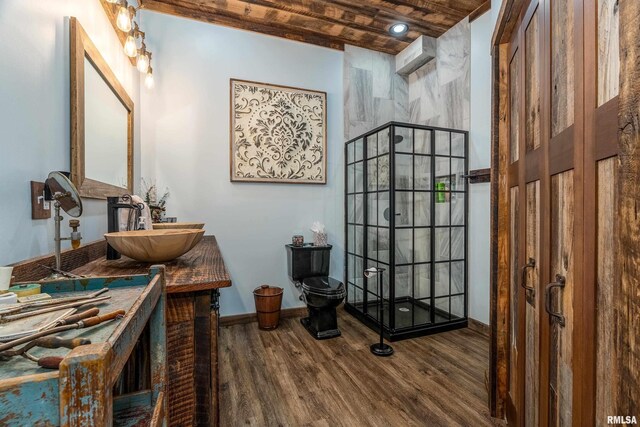 540 Kendall Ln, Marion, IL 62959 - full bath featuring wood finished floors, baseboards, a shower, toilet, and vanity