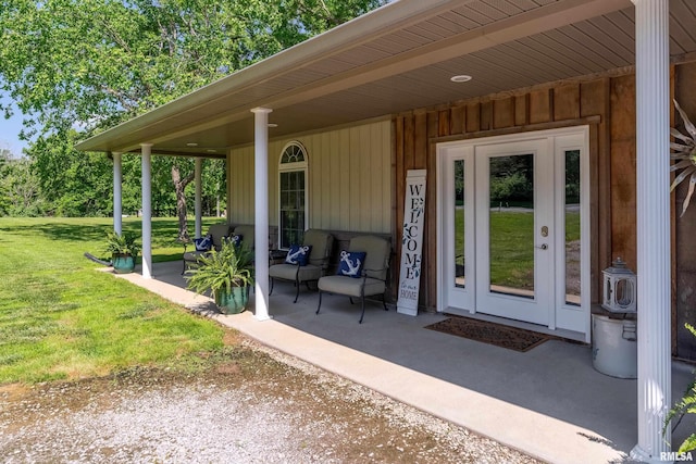 540 Kendall Ln, Marion, IL 62959 - view of exterior entry featuring a lawn and a porch
