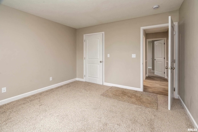 308 Prentice Ave, Carterville, IL 62918 - unfurnished bedroom with carpet flooring and baseboards