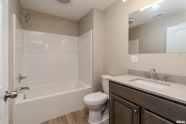 308 Prentice Ave, Carterville, IL 62918 - full bathroom featuring wood finished floors, toilet, shower / bath combination, and vanity