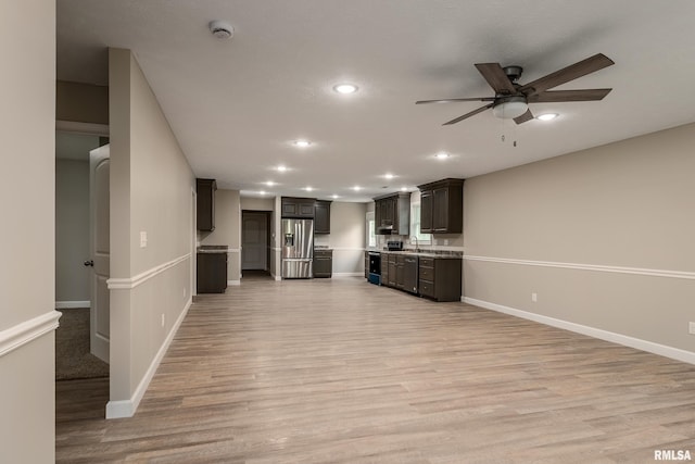 308 Prentice Ave, Carterville, IL 62918 - unfurnished living room featuring recessed lighting, ceiling fan, light wood-style flooring, baseboards, and a sink