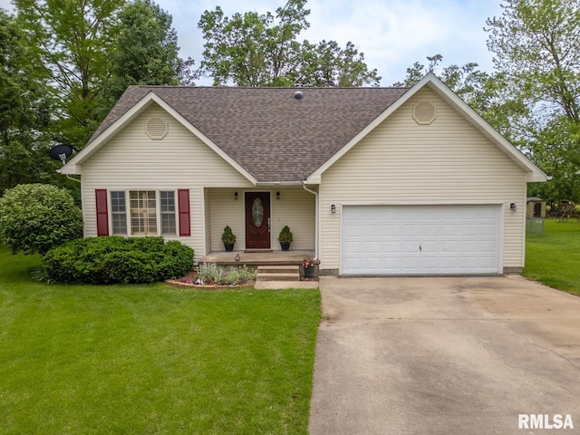 1021 Meadowlark Dr, Carterville, IL 62918 - view of front of house with concrete driveway, a garage, a shingled roof, a front lawn, and a porch