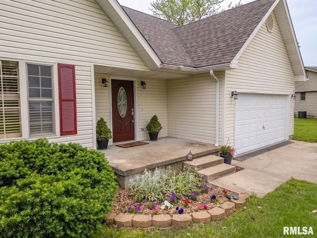 1021 Meadowlark Dr, Carterville, IL 62918 - view of front facade with a shingled roof and an attached garage