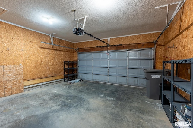 1021 Meadowlark Dr, Carterville, IL 62918 - garage featuring a garage door opener
