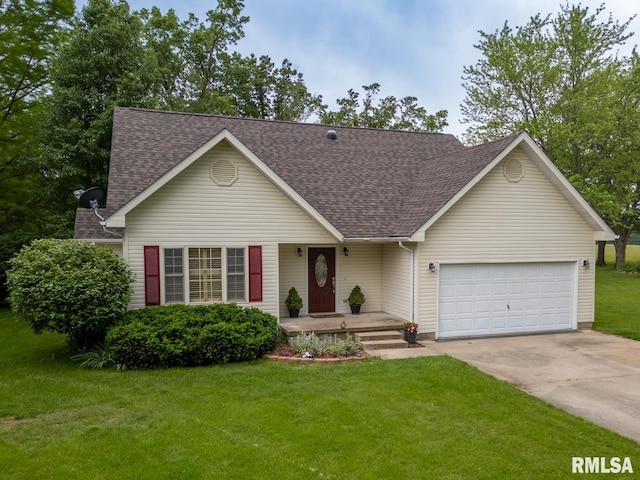 1021 Meadowlark Dr, Carterville, IL 62918 - view of front of house featuring a shingled roof, a garage, driveway, a front lawn, and a porch