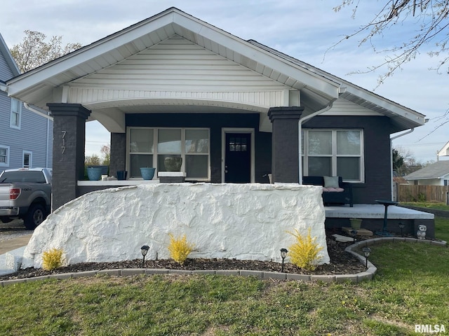 717 E Main St, Benton, IL 62812 - view of front of home featuring a porch