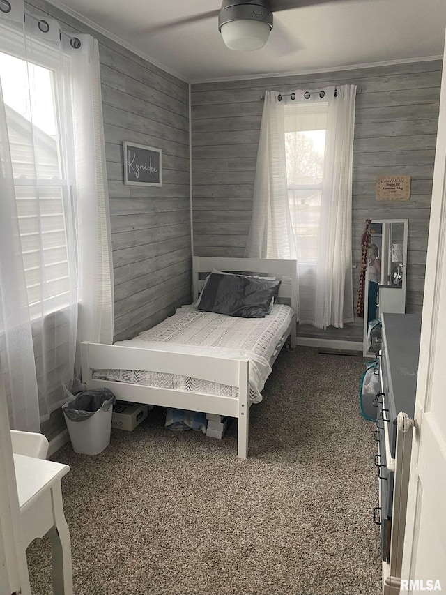 717 E Main St, Benton, IL 62812 - bedroom featuring ornamental molding, wooden walls, and a ceiling fan