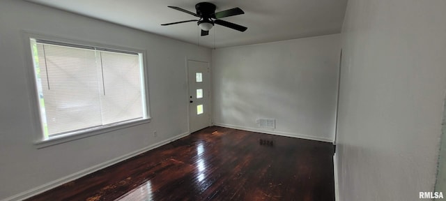2814 Mannen St, Mount Vernon, IL 62864 - unfurnished room featuring hardwood / wood-style floors, a ceiling fan, baseboards, and healthy amount of natural light
