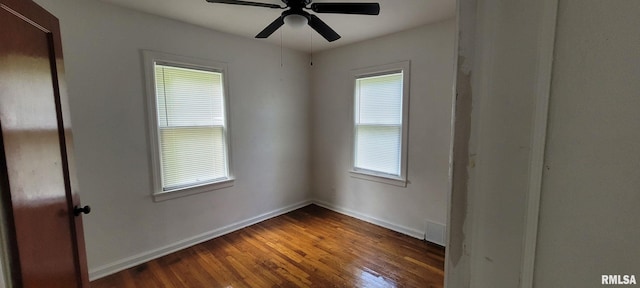 2814 Mannen St, Mount Vernon, IL 62864 - unfurnished room featuring plenty of natural light, hardwood / wood-style floors, baseboards, and a ceiling fan