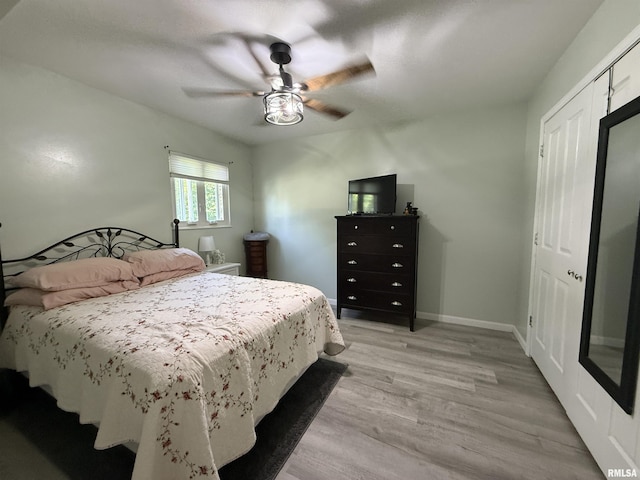 1144 S Morningside Dr, Carbondale, IL 62901 - bedroom with light wood-style floors, ceiling fan, and baseboards