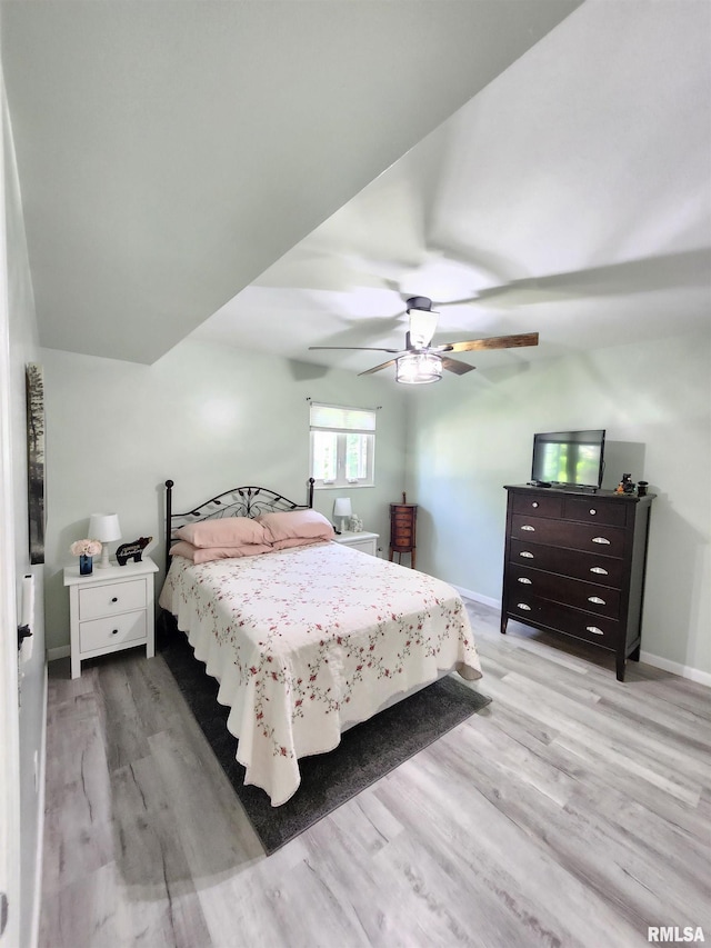 1144 S Morningside Dr, Carbondale, IL 62901 - bedroom featuring wood finished floors, a ceiling fan, and baseboards