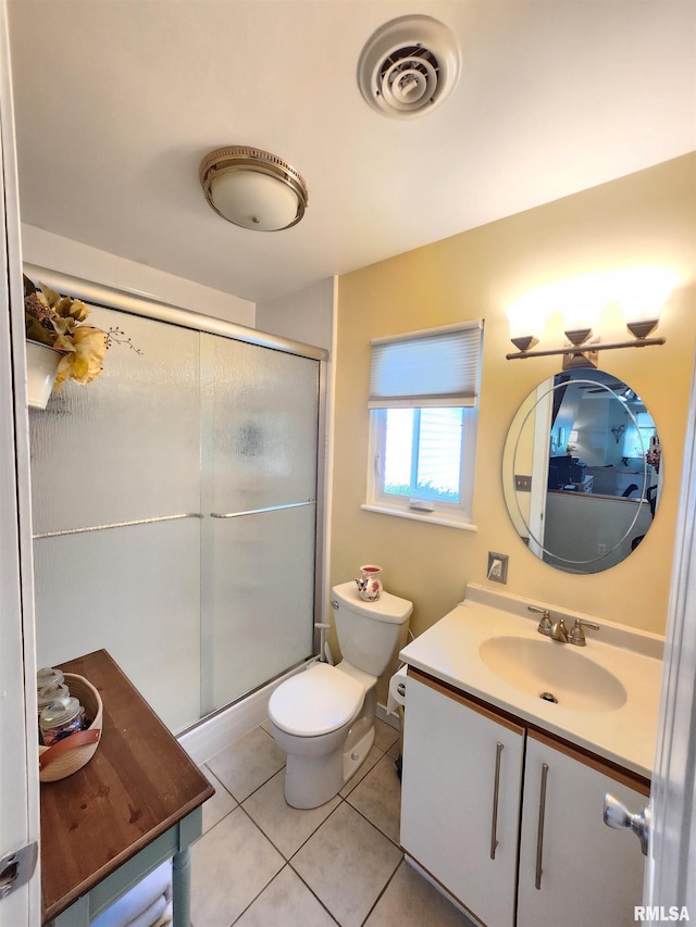 1144 S Morningside Dr, Carbondale, IL 62901 - bathroom featuring tile patterned flooring, a shower stall, toilet, and vanity
