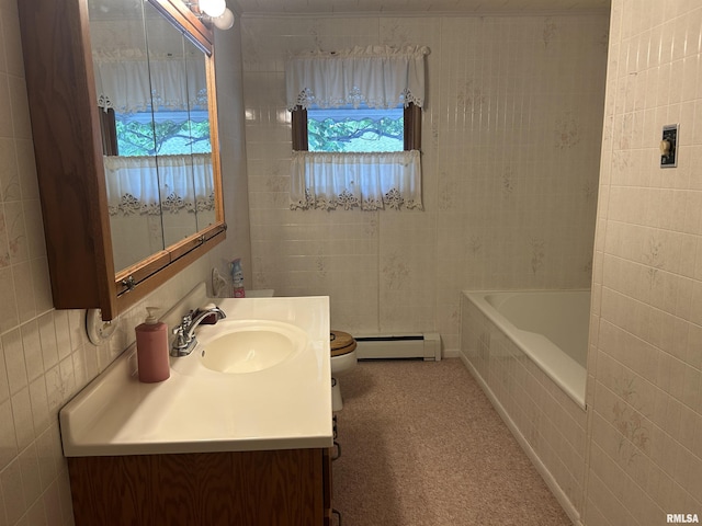 401 W 11th St, Christopher, IL 62822 - full bath featuring a baseboard radiator, a relaxing tiled tub, vanity, and toilet