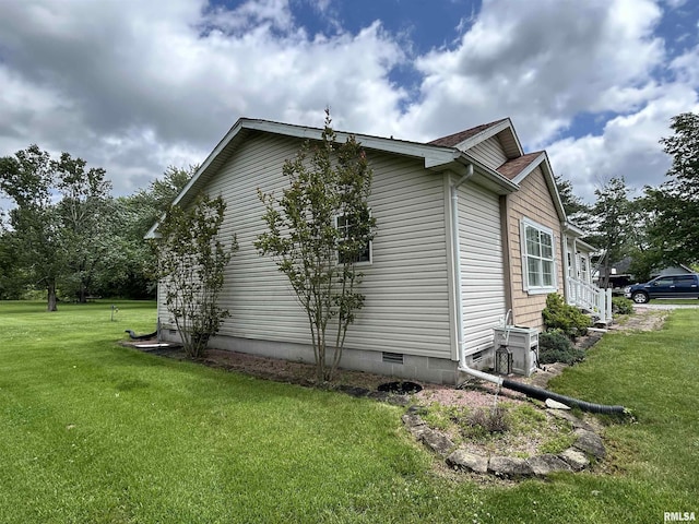 view of home's exterior featuring a lawn