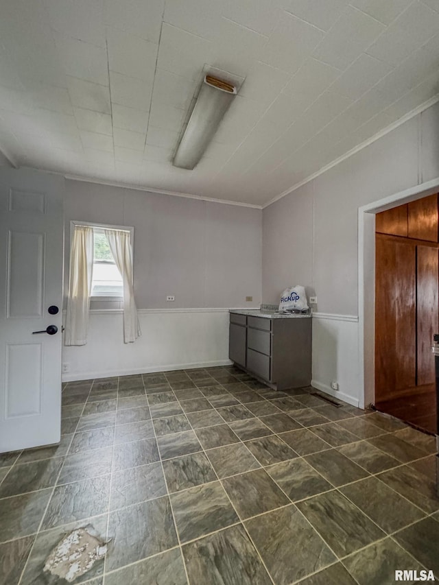 kitchen featuring crown molding