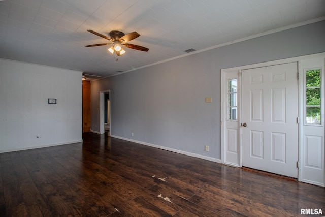foyer entrance with ceiling fan, dark wood-style floors, ornamental molding, and baseboards