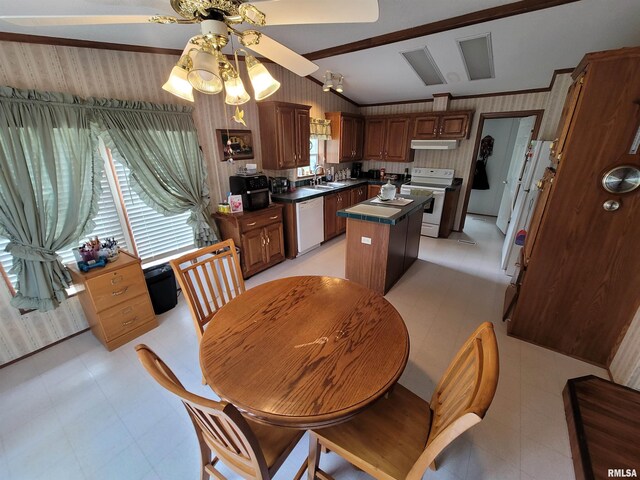 3614 S Hotze Rd, Salem, IL 62881 - dining space with ceiling fan, healthy amount of natural light, wallpapered walls, and light flooring