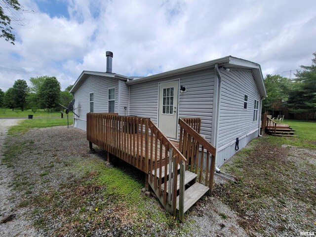 3614 S Hotze Rd, Salem, IL 62881 - back of house featuring a wooden deck