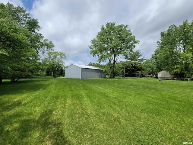 3614 S Hotze Rd, Salem, IL 62881 - view of grassy yard with an outbuilding and a pole building