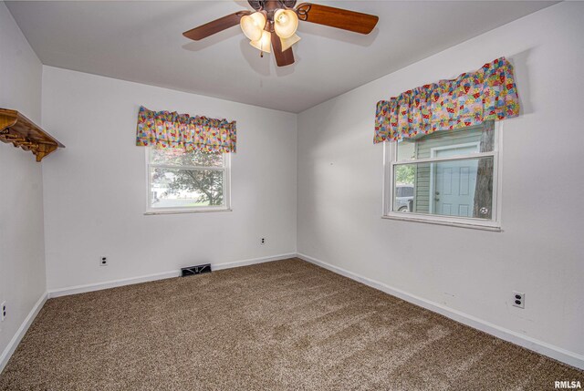 1103 W Boone St, Salem, IL 62881 - carpeted spare room featuring healthy amount of natural light, ceiling fan, and baseboards
