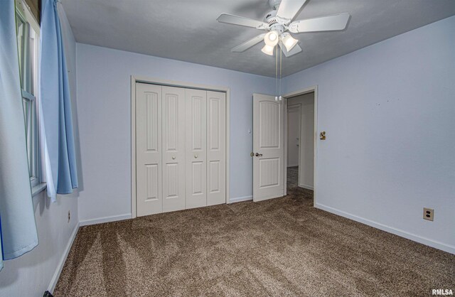 1103 W Boone St, Salem, IL 62881 - unfurnished bedroom featuring carpet floors, a closet, baseboards, and ceiling fan