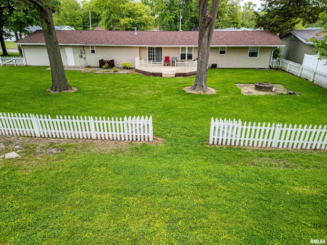 1103 W Boone St, Salem, IL 62881 - back of house with a fire pit and a deck