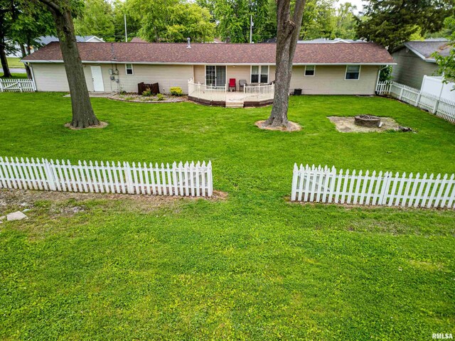 1103 W Boone St, Salem, IL 62881 - single story home featuring a porch, an attached garage, driveway, and a front lawn