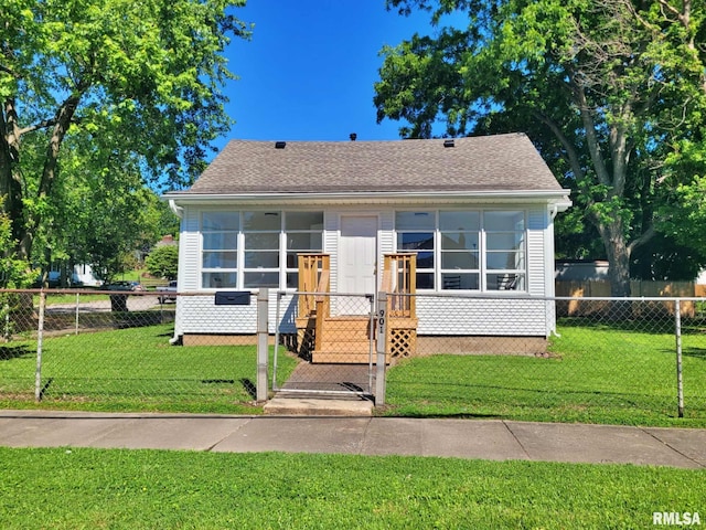 901 Catherine St, Metropolis, IL 62960 - view of front facade with a gate and roof with shingles