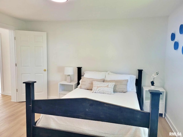 901 Catherine St, Metropolis, IL 62960 - bedroom featuring wood finished floors and baseboards