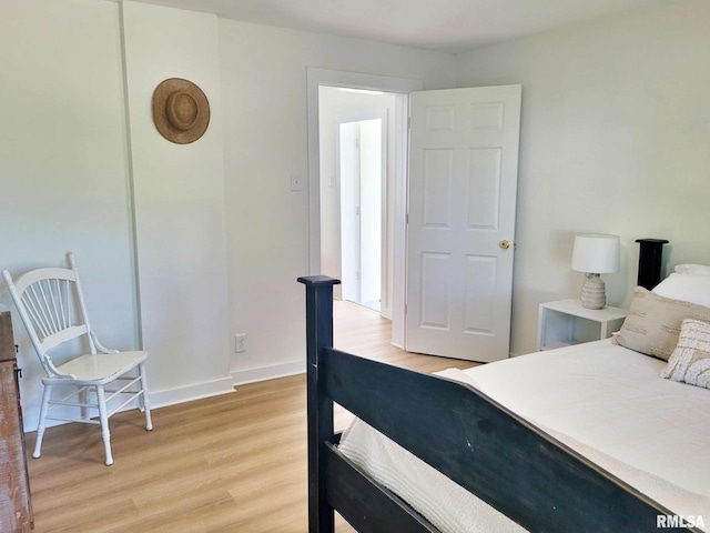 901 Catherine St, Metropolis, IL 62960 - bedroom featuring light wood-style flooring and baseboards