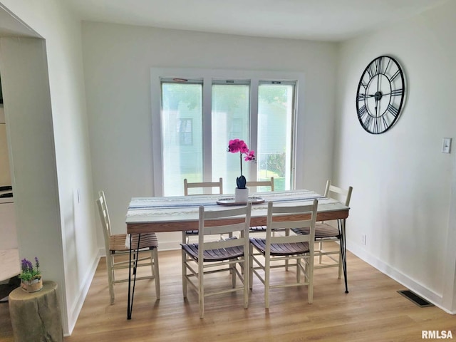 901 Catherine St, Metropolis, IL 62960 - dining space featuring light wood-type flooring and baseboards