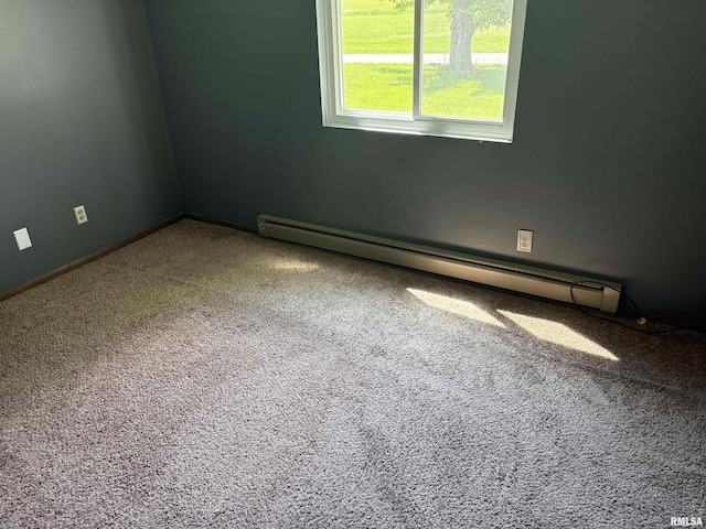 100 N 35th St, Herrin, IL 62948 - carpeted spare room with a baseboard heating unit and baseboards