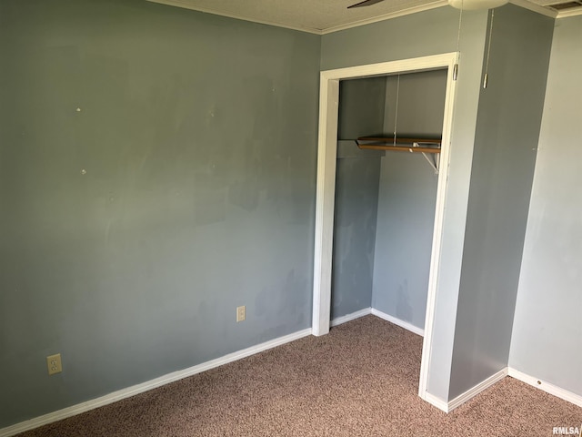 100 N 35th St, Herrin, IL 62948 - unfurnished bedroom featuring carpet flooring, baseboards, a closet, and ornamental molding