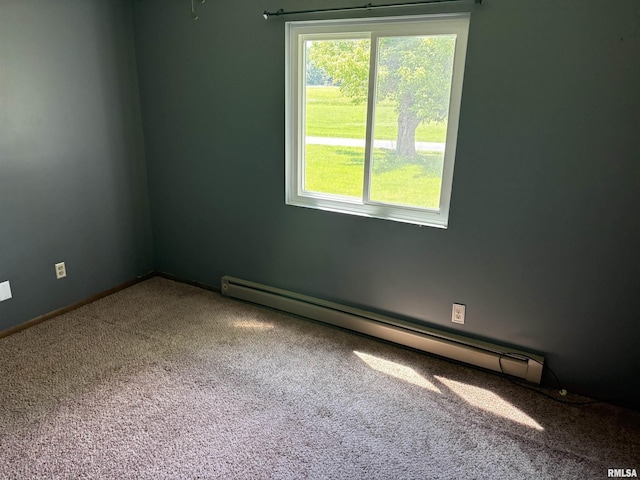 100 N 35th St, Herrin, IL 62948 - unfurnished room with a baseboard radiator and carpet flooring
