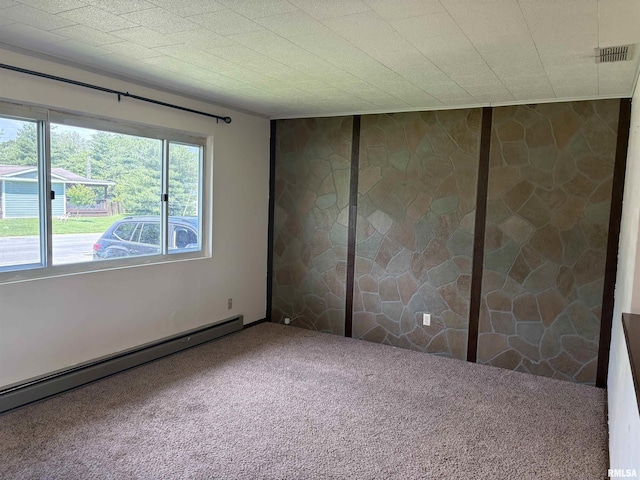 100 N 35th St, Herrin, IL 62948 - carpeted empty room featuring a baseboard radiator