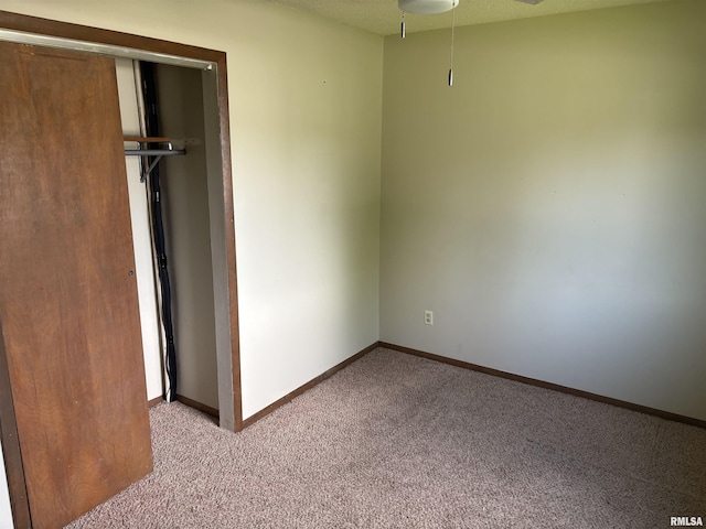 100 N 35th St, Herrin, IL 62948 - unfurnished bedroom featuring light colored carpet, baseboards, and a closet