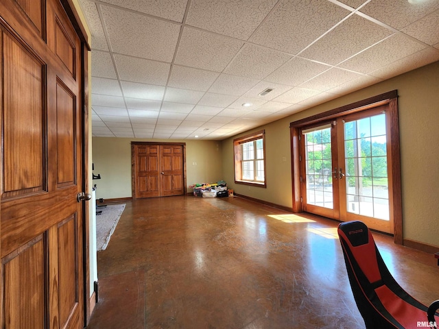 580 Blackman Hill Rd, Harrisburg, IL 62946 - foyer with french doors, baseboards, a drop ceiling, and concrete floors