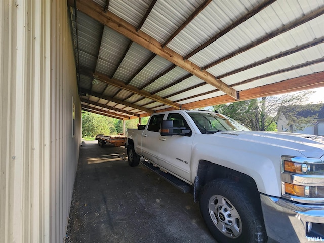 580 Blackman Hill Rd, Harrisburg, IL 62946 - view of car parking with an attached carport
