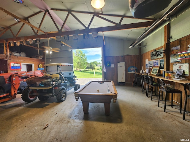 580 Blackman Hill Rd, Harrisburg, IL 62946 - garage featuring wood walls and a wainscoted wall