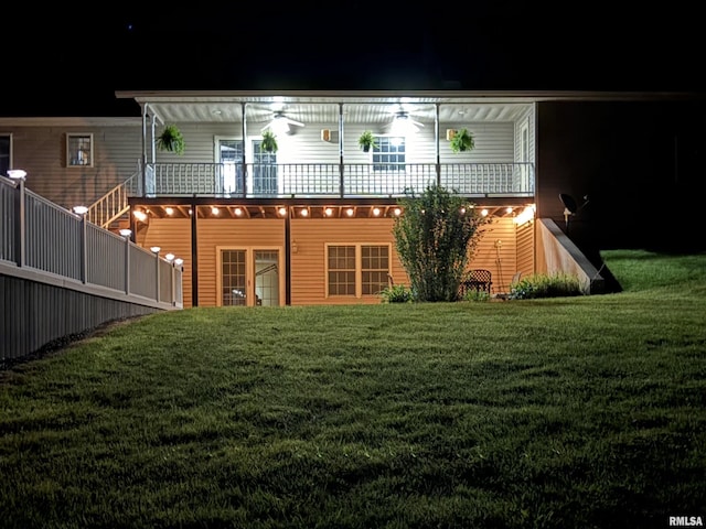 580 Blackman Hill Rd, Harrisburg, IL 62946 - back of house at twilight with a yard