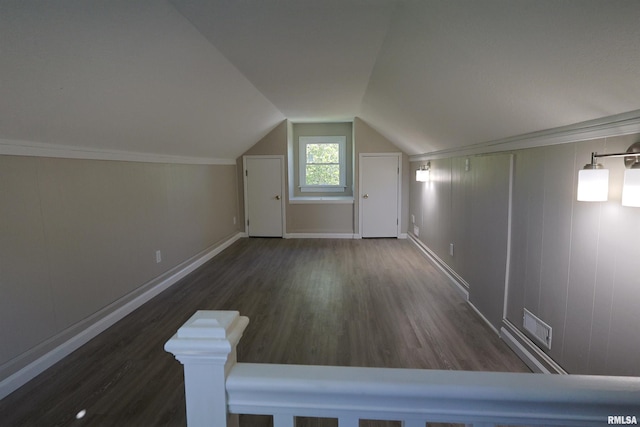 621 E Oglesby, Salem, IL 62881 - additional living space featuring dark wood-style flooring, vaulted ceiling, and baseboards